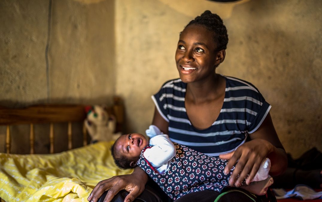 Lilian Mokobi, 24, with her baby in Kibera, Nairobi